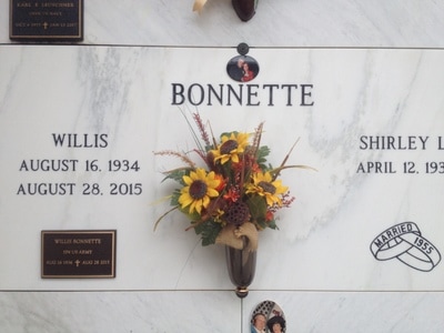 Bronze plaque installed at gravesite